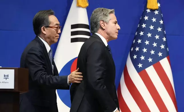 U.S. Secretary of State Antony Blinken, right, is escorted by South Korean Foreign Minister Cho Tae-yul, left, after a joint press conference following their meeting at the Foreign Ministry in Seoul, South Korea, Monday, Jan. 6, 2025. (AP Photo/Lee Jin-man, Pool)