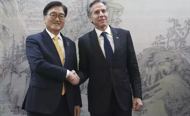 U.S. Secretary of State Antony Blinken, right, and South Korea's National Assembly Speaker Woo Won Shik, left, shake hands during a meeting at the National Assembly in Seoul, South Korea, Monday, Jan. 6, 2025. (AP Photo/Lee Jin-man, Pool)