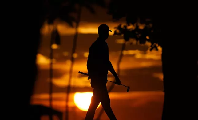 Harris English walks on the 10th green during the first round of the Sony Open golf event, Thursday, Jan. 9, 2025, at Waialae Country Club in Honolulu. (AP Photo/Matt York)