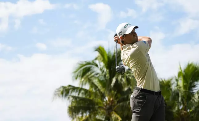 Thomas Detry, of Belgium, hits on the 14th hole during the first round of the Sony Open golf event, Thursday, Jan. 9, 2025, at Waialae Country Club in Honolulu. (AP Photo/Matt York)