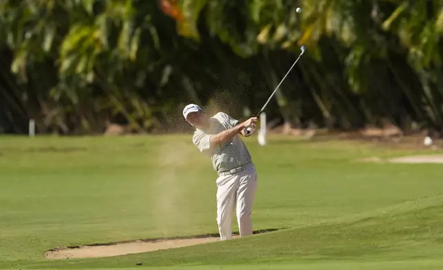 Russell Henley hits off the ninth fairway during the first round of the Sony Open golf event, Thursday, Jan. 9, 2025, at Waialae Country Club in Honolulu. (AP Photo/Matt York)