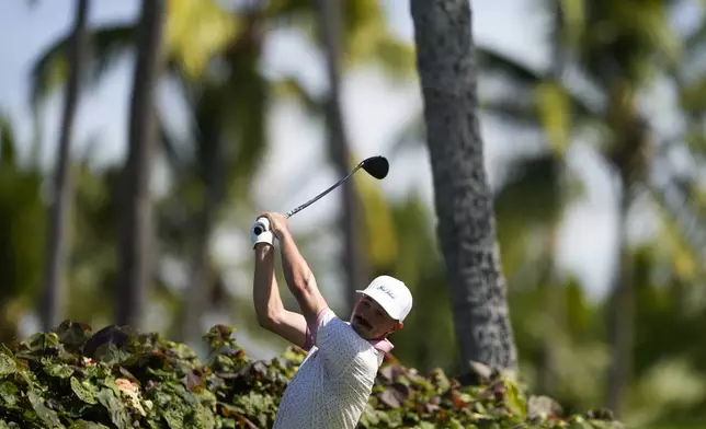 Paul Peterson hits on the 18th hole during the first round of the Sony Open golf event, Thursday, Jan. 9, 2025, at Waialae Country Club in Honolulu. (AP Photo/Matt York)