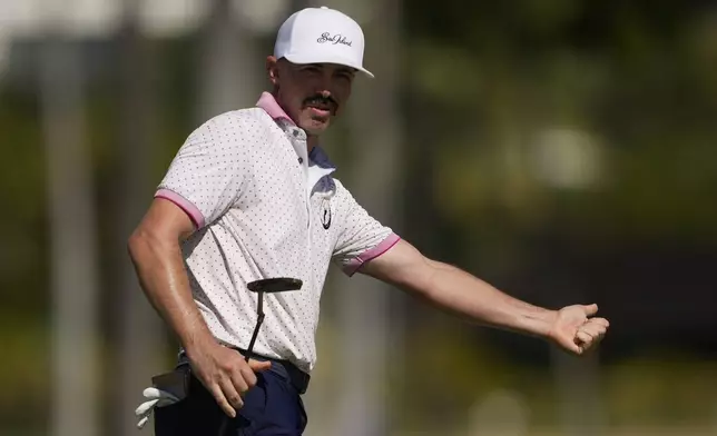 Paul Peterson reacts after his shot on the 16th hole during the first round of the Sony Open golf event, Thursday, Jan. 9, 2025, at Waialae Country Club in Honolulu. (AP Photo/Matt York)