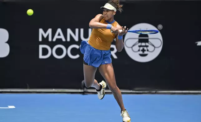 Naomi Osaka of Japan plays a shot against Julia Grabher of Austria in their women's singles match of the ASB Classic tennis tournament at Manuka Doctor Arena in Auckland, New Zealand on Wednesday, Jan. 1, 2025. (Alan Lee/Photosport via AP)