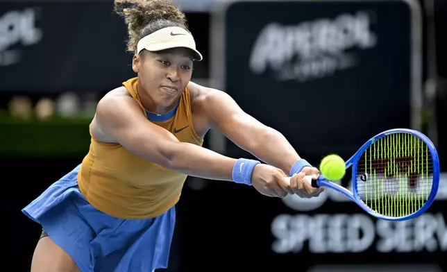 Naomi Osaka of Japan plays a shot against Julia Grabher of Austria in their women's singles match of the ASB Classic tennis tournament at Manuka Doctor Arena in Auckland, New Zealand on Wednesday, Jan. 1, 2025. (Alan Lee/Photosport via AP)