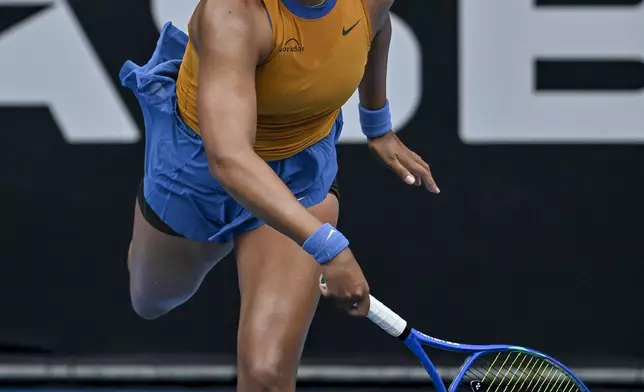 Naomi Osaka of Japan plays a shot against Julia Grabher of Austria in their women's singles match of the ASB Classic tennis tournament at Manuka Doctor Arena in Auckland, New Zealand on Wednesday, Jan. 1, 2025. (Alan Lee/Photosport via AP)