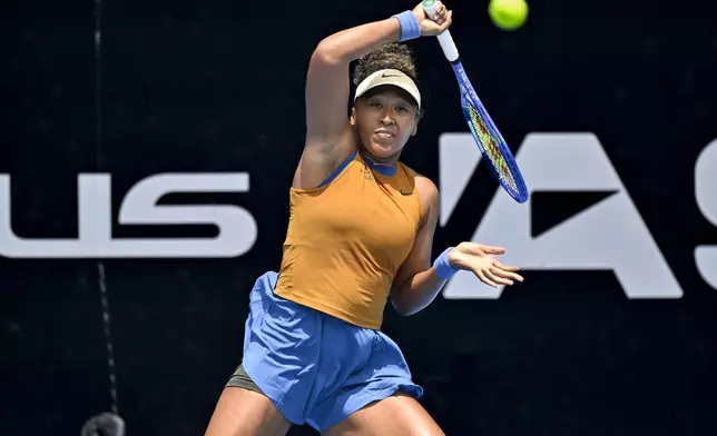 Naomi Osaka of Japan plays a shot against Julia Grabher of Austria in their women's singles match of the ASB Classic tennis tournament at Manuka Doctor Arena in Auckland, New Zealand on Wednesday, Jan. 1, 2025. (Alan Lee/Photosport via AP)