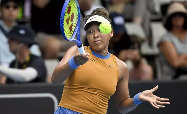 Naomi Osaka of Japan plays a shot against Julia Grabher of Austria in their women's singles match of the ASB Classic tennis tournament at Manuka Doctor Arena in Auckland, New Zealand on Wednesday, Jan. 1, 2025. (Alan Lee/Photosport via AP)