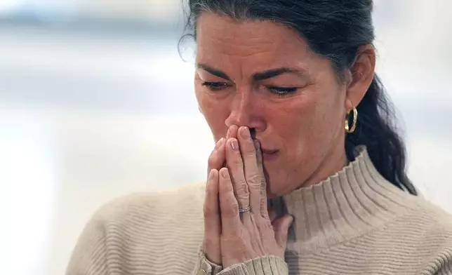 Former Olympic skater Nancy Kerrigan pauses while addressing the media at The Skating Club of Boston, The Skating Club of Boston, where six members of the club's community, including athletes, coaches and family, were killed in an airplane collision with a helicopter on Wednesday in Washington, Thursday, Jan. 30, 2025, in Norwood, Mass. (AP Photo/Charles Krupa)