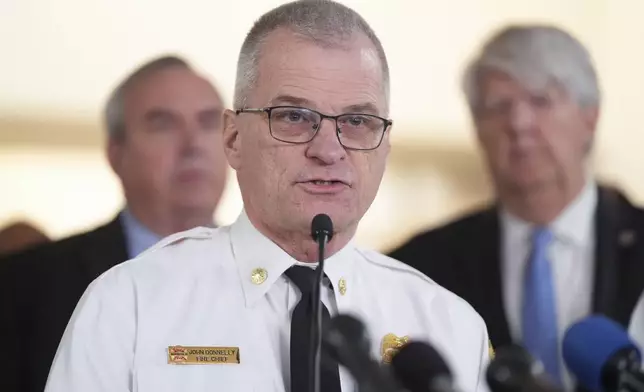 D.C. Fire and EMS Chief John Donnelly, speaks during a news conference at Ronald Reagan Washington National Airport, Thursday morning, Jan. 30, 2025, in Arlington, Va. (AP Photo/Mark Schiefelbein)