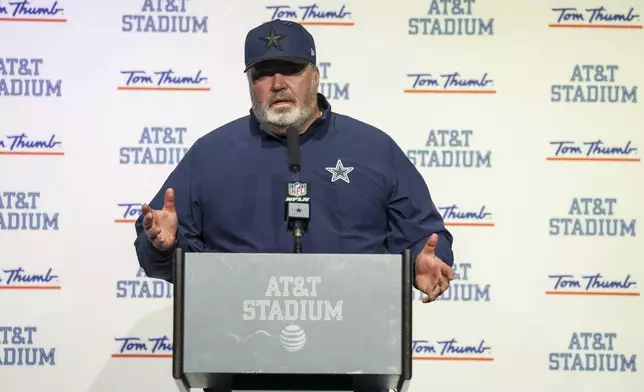 Dallas Cowboys head coach Mike McCarthy talks to reporters following an NFL football game against the Washington Commanders, Sunday, Jan. 5, 2025, in Arlington, Texas. The Commanders won 23-19. (AP Photo/Gareth Patterson)