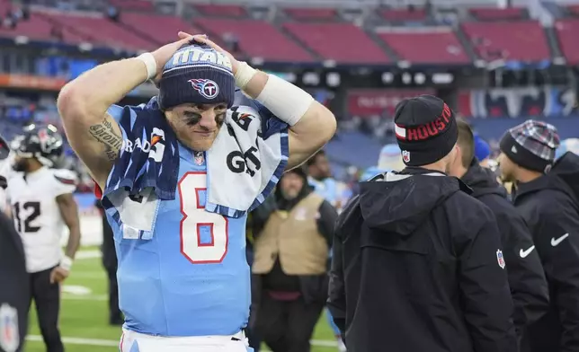 Tennessee Titans quarterback Will Levis (8) leaves the field after an NFL football game against the Houston Texans Sunday, Jan. 5, 2025, in Nashville, Tenn. The Texans won 23-14. (AP Photo/George Walker IV)