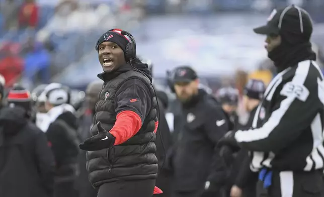 Houston Texans coach DeMeco Ryans yells to an official during the second half of an NFL football game against the Tennessee Titans Sunday, Jan. 5, 2025, in Nashville, Tenn. (AP Photo/John Amis)