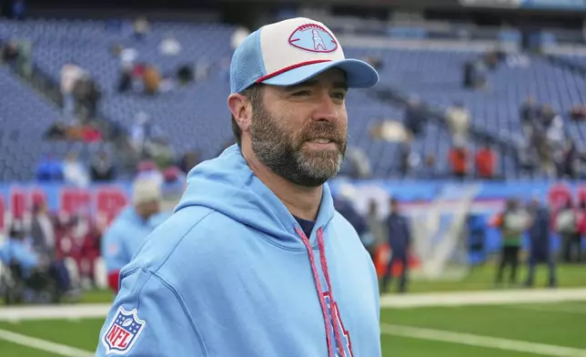 Tennessee Titans coach Brian Callahan watches warm-ups before an NFL football game against the Houston Texans Sunday, Jan. 5, 2025, in Nashville, Tenn. (AP Photo/George Walker IV)