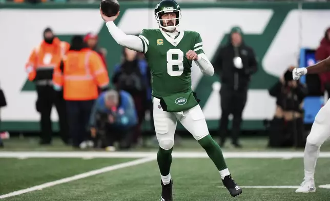 New York Jets quarterback Aaron Rodgers (8) throws during the first half of an NFL football game against the Miami Dolphins, Sunday, Jan. 5, 2025, in East Rutherford, N.J. (AP Photo/Seth Wenig)