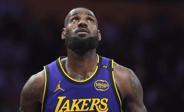 Los Angeles Lakers forward LeBron James waits for a rebound during the second half of an NBA basketball game against the Atlanta Hawks, Friday, Jan. 3, 2025, in Los Angeles. (AP Photo/Mark J. Terrill)