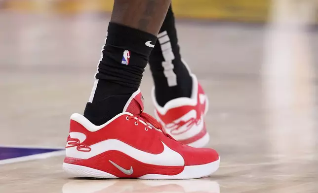 Los Angeles Lakers forward LeBron James' shoes are seen during the second half of an NBA basketball game against the Atlanta Hawks, Friday, Jan. 3, 2025, in Los Angeles. (AP Photo/Mark J. Terrill)