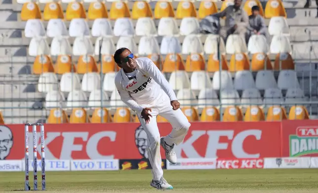 Pakistan's Noman Ali bowls during the day-one of the second cricket test match between Pakistan and West Indies, in Multan, Pakistan, Saturday, Jan. 25, 2025. (AP Photo/Asim Tanveer)