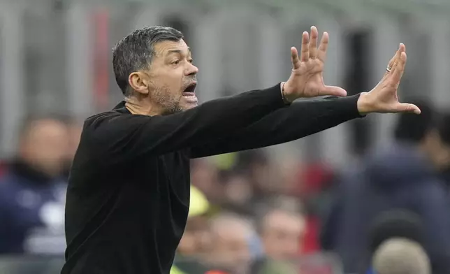 AC Milan's head coach Sergio Conceicao gestures during a Serie A soccer match between AC Milan and Parma, at the San Siro stadium in Milan, Italy, Sunday, Jan. 26, 2025. (AP Photo/Luca Bruno)