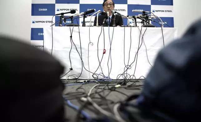 Eiji Hashimoto, chairman and CEO of Nippon Steel Corporation, answers a question during a press conference at their company headquarters Tuesday, Jan. 7, 2025, in Tokyo. (AP Photo/Eugene Hoshiko)