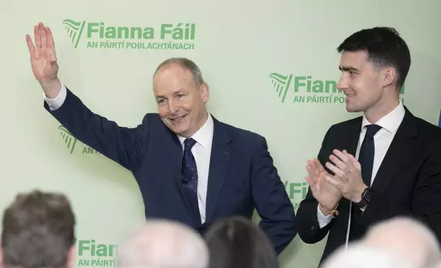 Fianna Fail leader Micheal Martin and deputy leader Jack Chambers during the Fianna Fail ard fheis conference at the Radisson Hotel, in Dublin, Sunday Jan. 19, 2025. (Gareth Chaney/PA via AP)