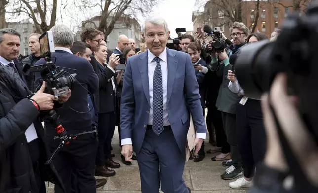 Irish independent politician who has served as a Teachta Dala, Michael Lowry, speaks to journalists ahead of the election of Fianna Fail's Micheal Martin in Dublin, Wednesday, Jan. 22, 2025.(AP Photo/Peter Morrison)