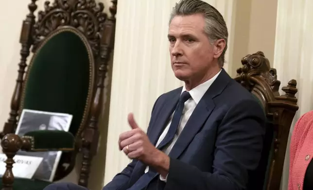 FILE - California Gov. Gavin Newsom gives a "thumbs up" talks while attending the Assembly's Organizational Session in Sacramento, Calif., Dec. 2, 2024. (AP Photo/Rich Pedroncelli, file)