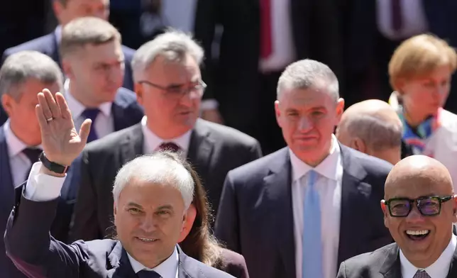 Russia's Chairman of the State Duma Vyacheslav Volodin, left, and Venezuelan National Assembly President Jorge Rodriguez walk together after attending the swearing-in ceremony of President Nicolas Maduro for a third term at the National Assembly in Caracas, Venezuela, Friday, Jan. 10, 2025. (AP Photo/Matias Delacroix)