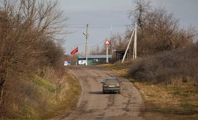 A car heads to a border crossing between Moldova and Transistria in Copanca, Moldova, Wednesday, Jan. 8, 2025. (AP Photo)