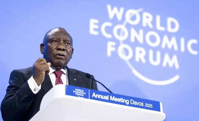 Cyril Ramaphosa, President of South Africa delivers a speech during a plenary session in the Congress Hall, during the 55th annual meeting of the World Economic Forum, WEF, in Davos, Switzerland, Tuesday, Jan. 21, 2025. (Michael Buholzer/Keystone via AP)