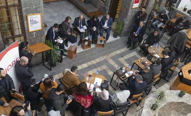 French Foreign Minister Jean-Noel Barrot meets with representatives of civil society during an official visit, in Damascus, Syria, Friday, Jan. 3, 2025. (AP Photo/Mosa'ab Elshamy)