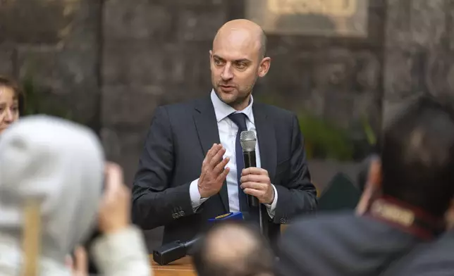 French Foreign Minister Jean-Noel Barrot meets with representatives of civil society during an official visit, in Damascus, Syria, Friday, Jan. 3, 2025. (AP Photo/Mosa'ab Elshamy)