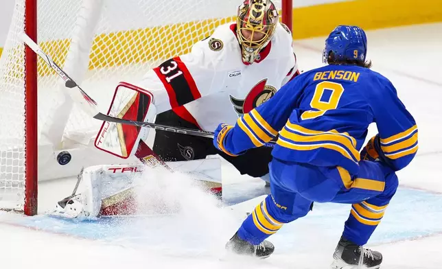 Ottawa Senators goalie Anton Forsberg (31) makes a save on Buffalo Sabres' Zach Benson (9) during first period NHL hockey action in Ottawa on Thursday, Jan. 9, 2025. (Sean Kilpatrick/The Canadian Press via AP)