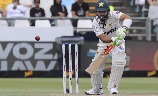 Pakistan's Mohammad Rizwan plays a shot during the third day of the second Test match between South Africa and Pakistan in Cape Town, South Africa, Sunday, Jan. 5, 2025. (AP Photo/Halden Krog)