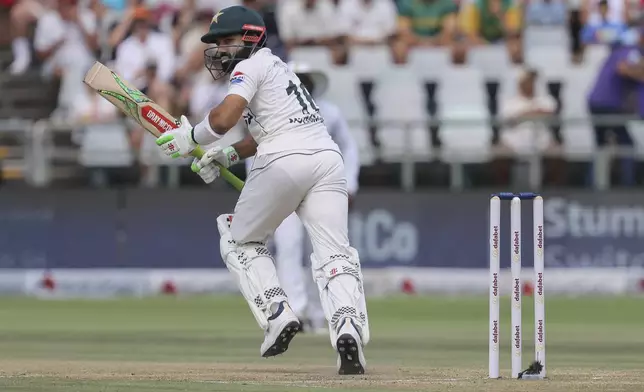 Pakistan's Mohammad Rizwan runs after hitting the ball during the third day of the second Test match between South Africa and Pakistan in Cape Town, South Africa, Sunday, Jan. 5, 2025. (AP Photo/Halden Krog)