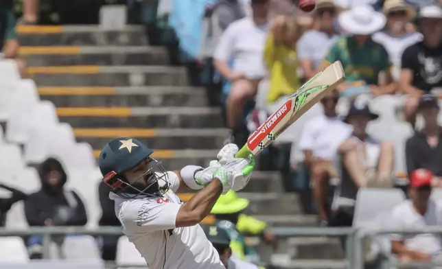 Pakistan's Mohammad Rizwan smashes the ball for six runs during the third day of the second Test match between South Africa and Pakistan in Cape Town, South Africa, Sunday, Jan. 5, 2025. (AP Photo/Halden Krog)