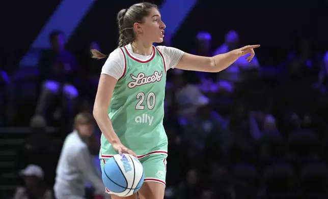 Laces guard Kate Martin dribbles during the first half of an Unrivaled 3-on-3 basketball game against Vinyl, Friday, Jan. 24, 2025, in Medley, Fla. (AP Photo/Lynne Sladky)