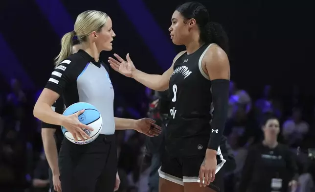 Phantom forward Satou Sabally (0) talks with an official during the first half of an Unrivaled 3-on-3 basketball game against Mist, Friday, Jan. 24, 2025, in Medley, Fla. (AP Photo/Lynne Sladky)