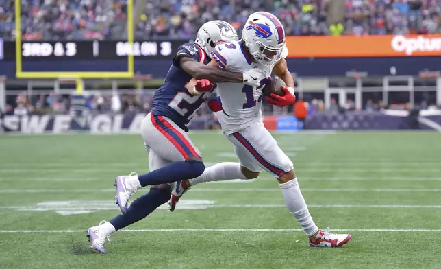 Buffalo Bills wide receiver Mack Hollins, right, tries to break free from New England Patriots cornerback Marcellas Dial Jr. (27) during the first half of an NFL football game, Sunday, Jan. 5, 2025, in Foxborough, Mass. (AP Photo/Steven Senne)