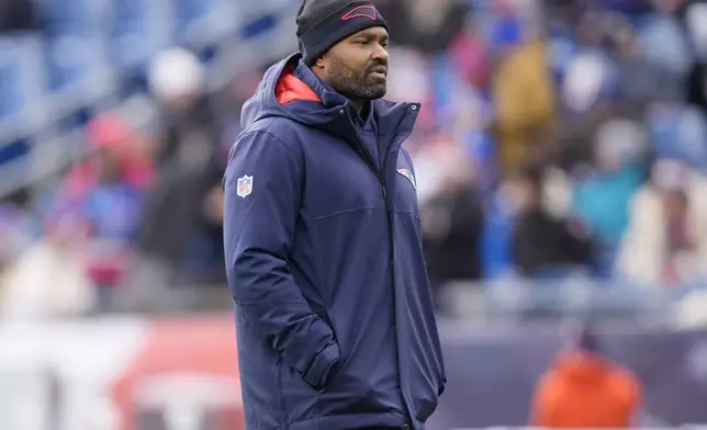 New England Patriots head coach Jerod Mayo walks on the field prior to an NFL football game against the Buffalo Bills, Sunday, Jan. 5, 2025, in Foxborough, Mass. (AP Photo/Robert F. Bukaty)