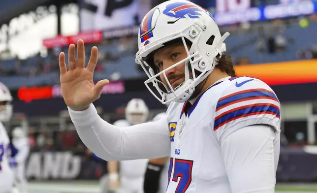 Buffalo Bills quarterback Josh Allen (17) waves to fans prior to an NFL football game against the New England Patriots, Sunday, Jan. 5, 2025, in Foxborough, Mass. (AP Photo/Steven Senne)