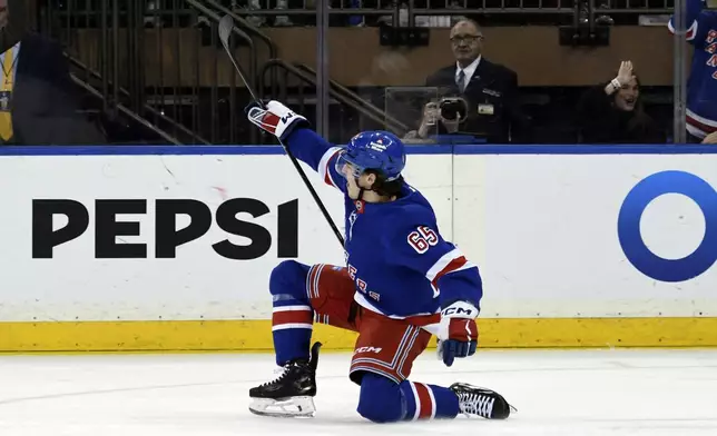 New York Rangers' Brett Berard reacts after scoring during the first period of an NHL hockey game against the Boston Bruins, Thursday, Jan. 2, 2025, in New York. (AP Photo/Pamela Smith)