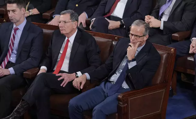 From left, Sen. Tom Cotton, R-Ark., Sen. John Barrasso, R-Wyo., and Senate Majority Leader John Thune, R-S.D., listen during a joint session of Congress to confirm the Electoral College votes, affirming President-elect Donald Trump's victory in the presidential election, Monday, Jan. 6, 2025, at the U.S. Capitol in Washington. (AP Photo/J. Scott Applewhite)