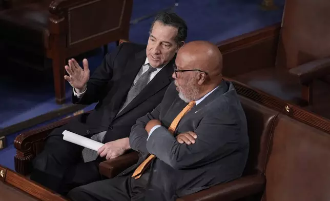 Rep. Jamie Raskin, D-Md., left, and Rep. Bennie Thompson, D-Miss., who chaired the House committee that investigated the Jan. 6, 2021, attack on the Capitol, confer in the House chamber as lawmakers gather for a joint session of Congress to certify the votes from the Electoral College in the presidential election, in Washington, Monday, Jan. 6, 2025. (AP Photo/J. Scott Applewhite)