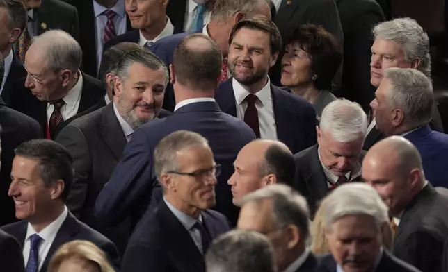 Republicans congratulate Vice President-elect JD Vance after a joint session of Congress convened to confirm the Electoral College votes, affirming President-elect Donald Trump's victory in the presidential election, Monday, Jan. 6, 2025, at the U.S. Capitol in Washington. (AP Photo/Manuel Balce Ceneta)