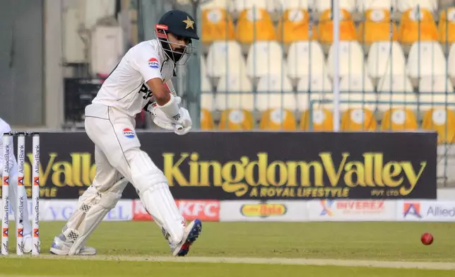 Pakistan's Saud Shakeel bats during the day one of the first test cricket match between Pakistan and West Indies, in Multan, Pakistan, Friday, Jan. 17, 2025. (AP Photo/Asim Tanveer)
