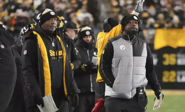 Pittsburgh Steelers head coach Mike Tomlin, right, on the sideline during the first half of an NFL football game against the Cincinnati Bengals in Pittsburgh, Saturday, Jan. 4, 2025. The Bengals won 19-17.(AP Photo/Gene J. Puskar)