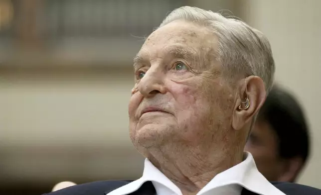 FILE - George Soros, founder and chairman of the Open Society Foundations, attends the Joseph A. Schumpeter Award ceremony in Vienna, Austria, June 21, 2019. (AP Photo/Ronald Zak, File)