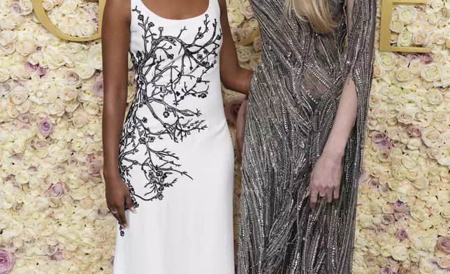 Zahara Jolie, left, and Angelina Jolie arrive at the 82nd Golden Globes on Sunday, Jan. 5, 2025, at the Beverly Hilton in Beverly Hills, Calif. (Photo by Jordan Strauss/Invision/AP)