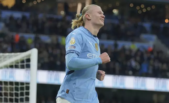 Manchester City's Erling Haaland celebrates after scoring his side's 2nd goal against West Ham during a English Premier League soccer match at Etihad stadium in Manchester, England, Saturday, Jan. 4, 2025. (AP Photo/Ian Hodgson)